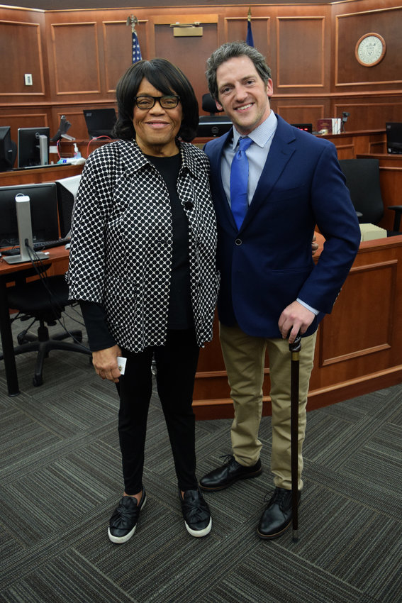 Shirley Bennett smiles with Mitchell Kohl, an attorney and medical doctor who helped perform CPR to save her life.